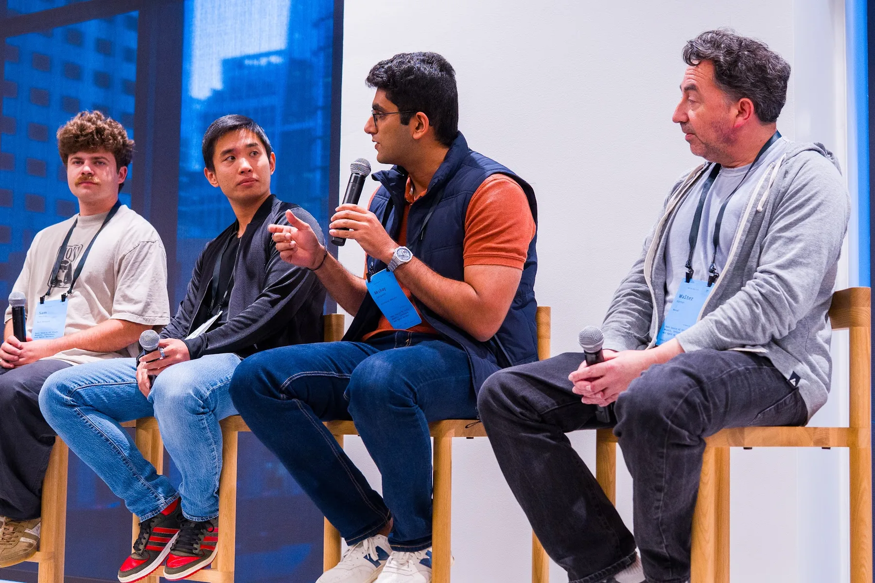 Panelists discuss the open AI stack in front of a live audience.